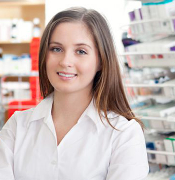 Smiling Pharmacist at walk in clinic and pharmacy